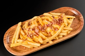 PAPAS CON QUESO CHEDAR Y TOCINETA