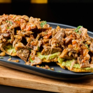 Tostones con carne.