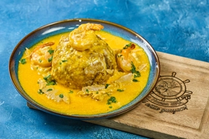 GREEN PLANTAIN BALL IN A SEAFOOD SAUCE