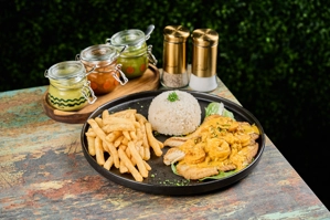 TILAPIA FILLET W/ SEAFOOD MIX IN COCONUT SAUCE