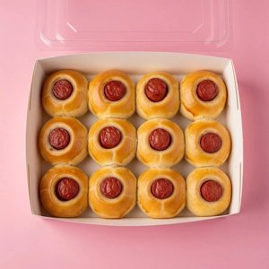 Small kolaches with sausage filling in a box, Dallas cuisine.