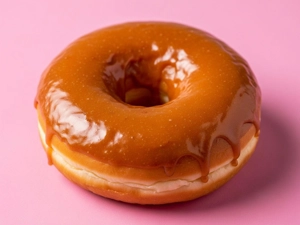 Maple Donut with a glossy maple glaze on a soft, fluffy base in Dallas.