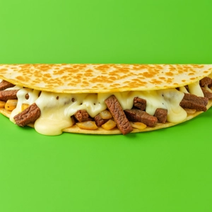 Quesadilla with melted mozzarella cheese and beef strips on a flour tortilla in Dallas.