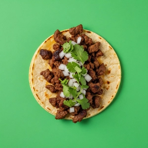 Beef Fajita Taco with grilled beef, chopped onion, and cilantro on a tortilla in Dallas.