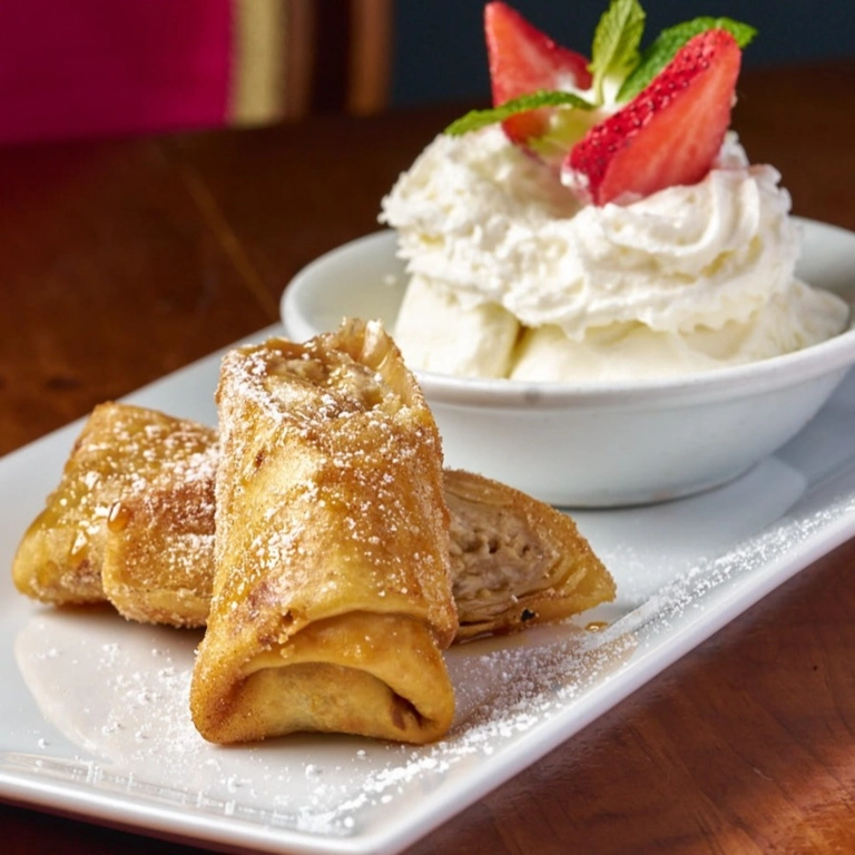 Despacito Chimichanga with powdered sugar and whipped cream in Wantagh.