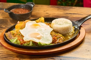 Steak with Creole Sauce & Two Fried Eggs