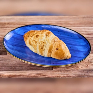 Small cheese bread with a golden crust on a blue plate. Cuisine type and city unknown.