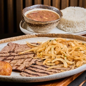 Bistec Encebollado / Steak Sauteed with Onions