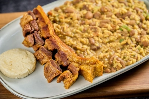 COLOMBIAN BREAKFAST W/ CRISPY PORK & AREPITA