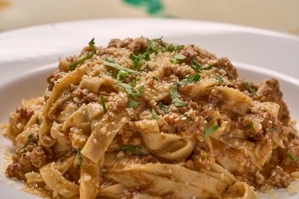 TAGLIATELLE BOLOGNESE