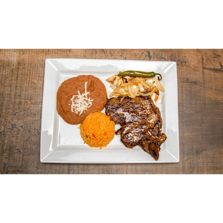 Carne Asada with grilled steak, Mexican rice, and refried beans in Roanoke.