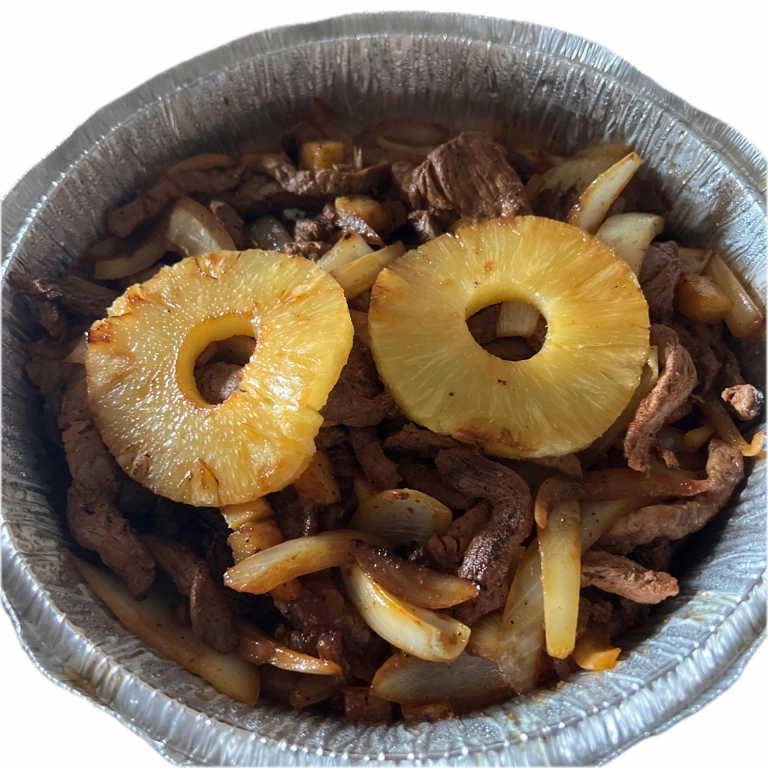 Hawaiian Fajitas with grilled pineapple rings, beef strips, and onions in Roanoke.