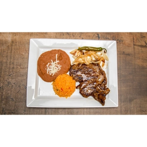Carne Asada with grilled steak, Mexican rice, and refried beans in Roanoke.