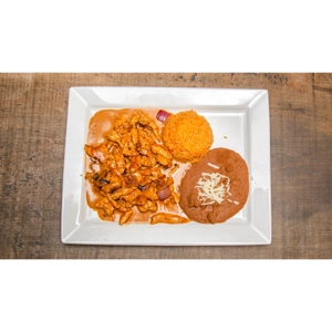 Pollo con Crema with chicken, onions, rice, and beans served in Roanoke.
