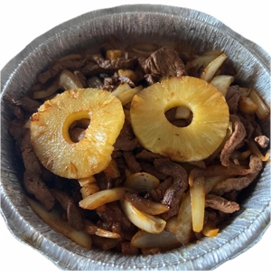 Hawaiian Fajitas with grilled pineapple rings, beef strips, and onions in Roanoke.