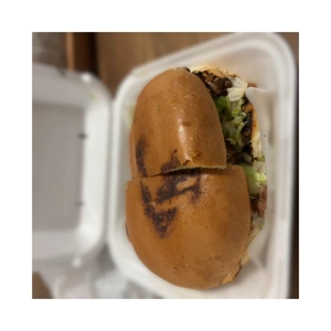 Torta Cubana with visible lettuce and sausage in Roanoke.