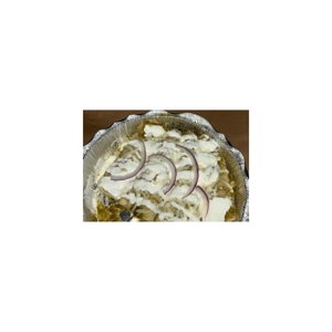Enchiladas Verdes with sour cream and red onion slices, Mexican cuisine in Roanoke.
