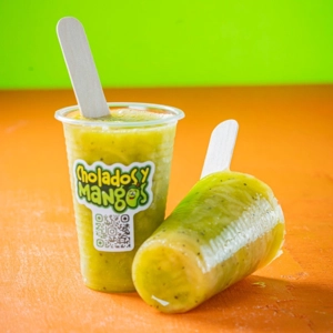 Paleta Mango Biche with visible green mango and seeds in Jackson Heights.