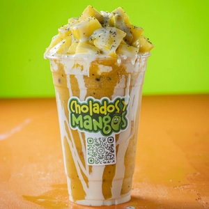 Frappe Maracumango with mango chunks and cream drizzle from Cholados y Mangos in Jackson Heights.