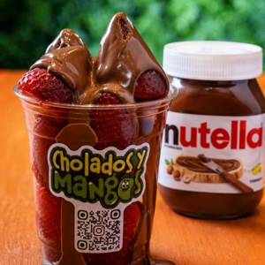 Fresas con Nutella with fresh strawberries and chocolate spread in Jackson Heights.