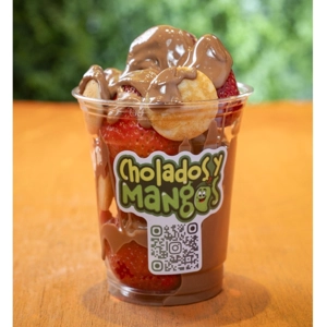 Mini pancakes with fresh strawberries and Nutella in a cup from Cholados y Mangos, Jackson Heights.