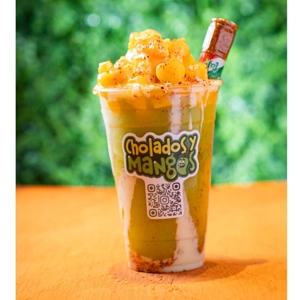 Mango Biche Frappe with green mango chunks and Tajín powder in Jackson Heights.
