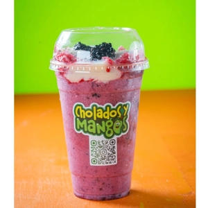 Morazo with crushed ice, visible blackberry pulp, and condensed milk in Jackson Heights.