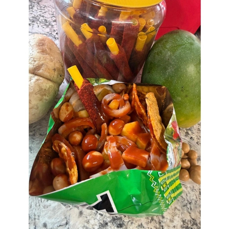 Tostilokos with jicama, tamarind candy, and hot sauce in Hermiston, OR.