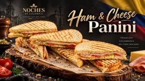 Panini de jamón y queso con rodajas de tomate y pan tostado. Tradición colombiana.