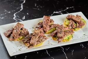TOSTONES CON CHURRASCO 