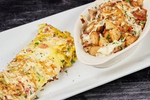 OMELETTE CON PAPAS GRATINADAS