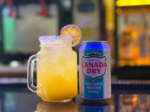 Passion fruit flavored soda with ice and a lemon slice in Union City.