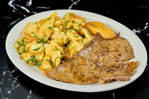 MIGAS WITH GRILLED STEAK