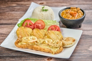 Breaded Fish Filet with Shrimp in White Sauce