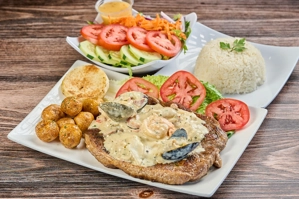 Sirloin Steak Topped with Seafood